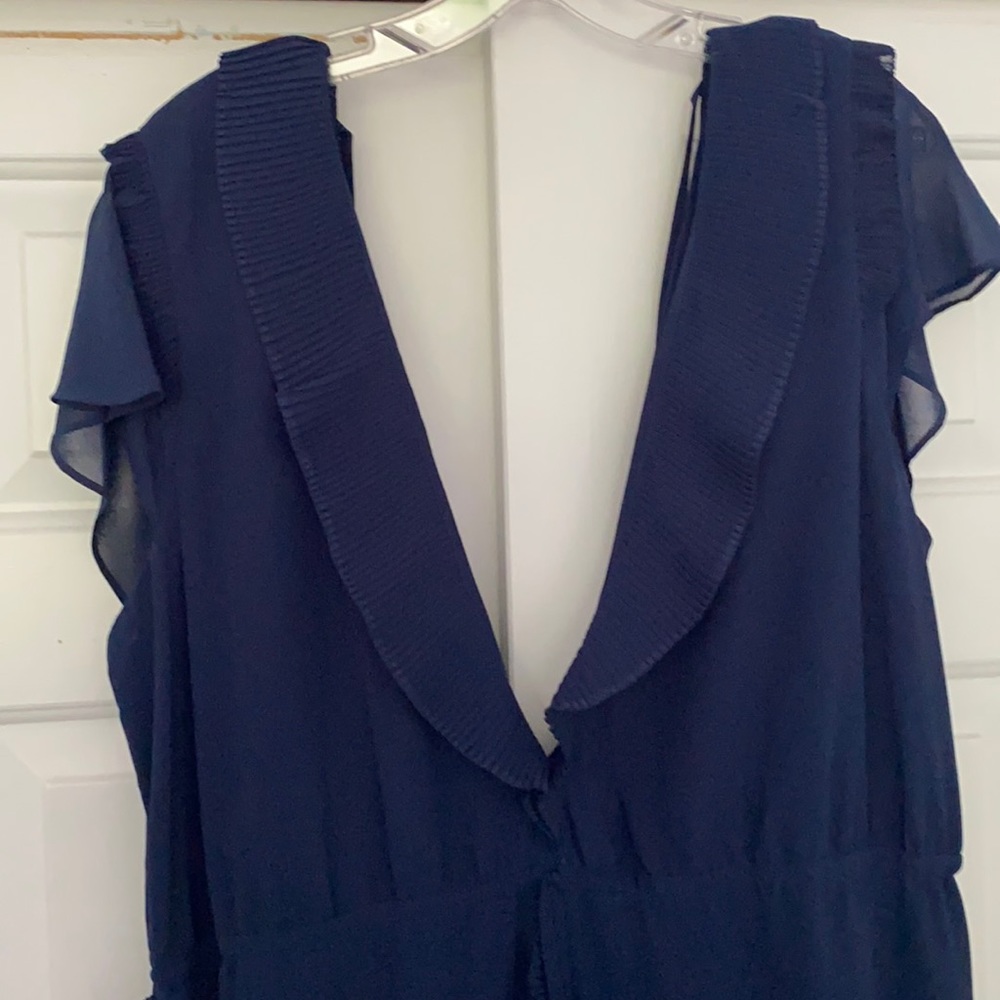 Navy blue dress with ruffle and tie details